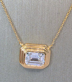 Load image into Gallery viewer, 2.84 Ct D VVS2 Emerald Cut Lab Grown Bezel Pendant 14k Yellow Gold IGI Certified