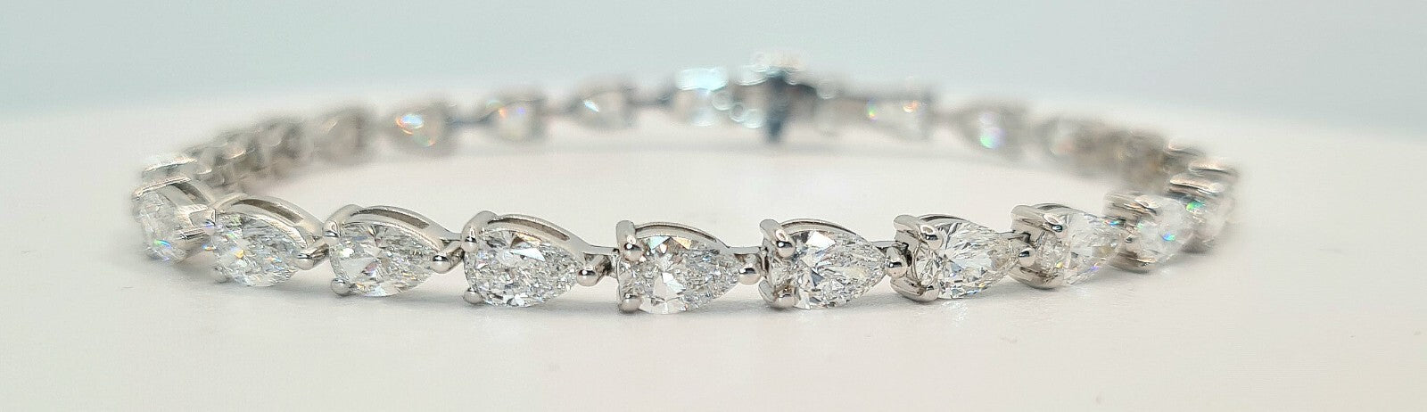 9 carat pear shape lab grown diamond tennis bracelet in 14K white gold, 7 inch length