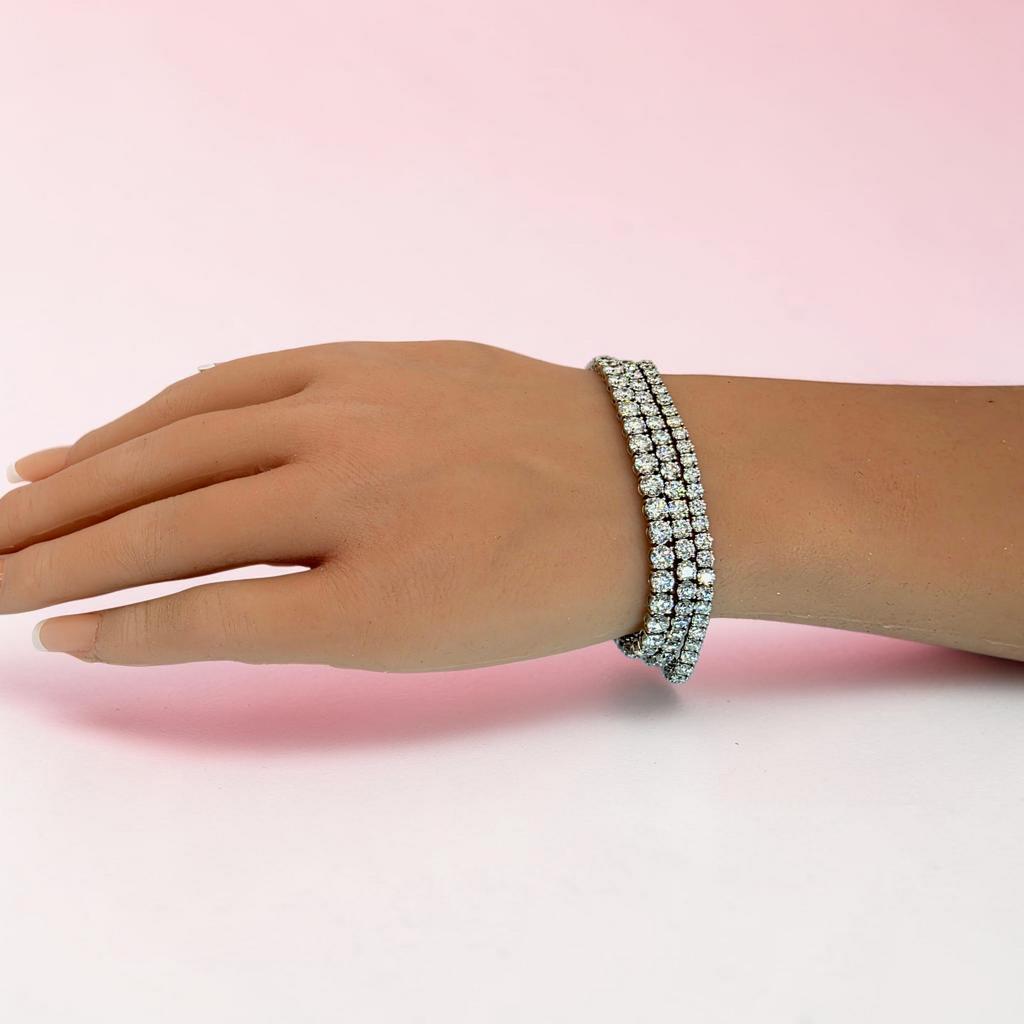 10 CTW D-E Color VS Round Lab Grown Diamond Tennis Bracelet, in white gold, on hand
