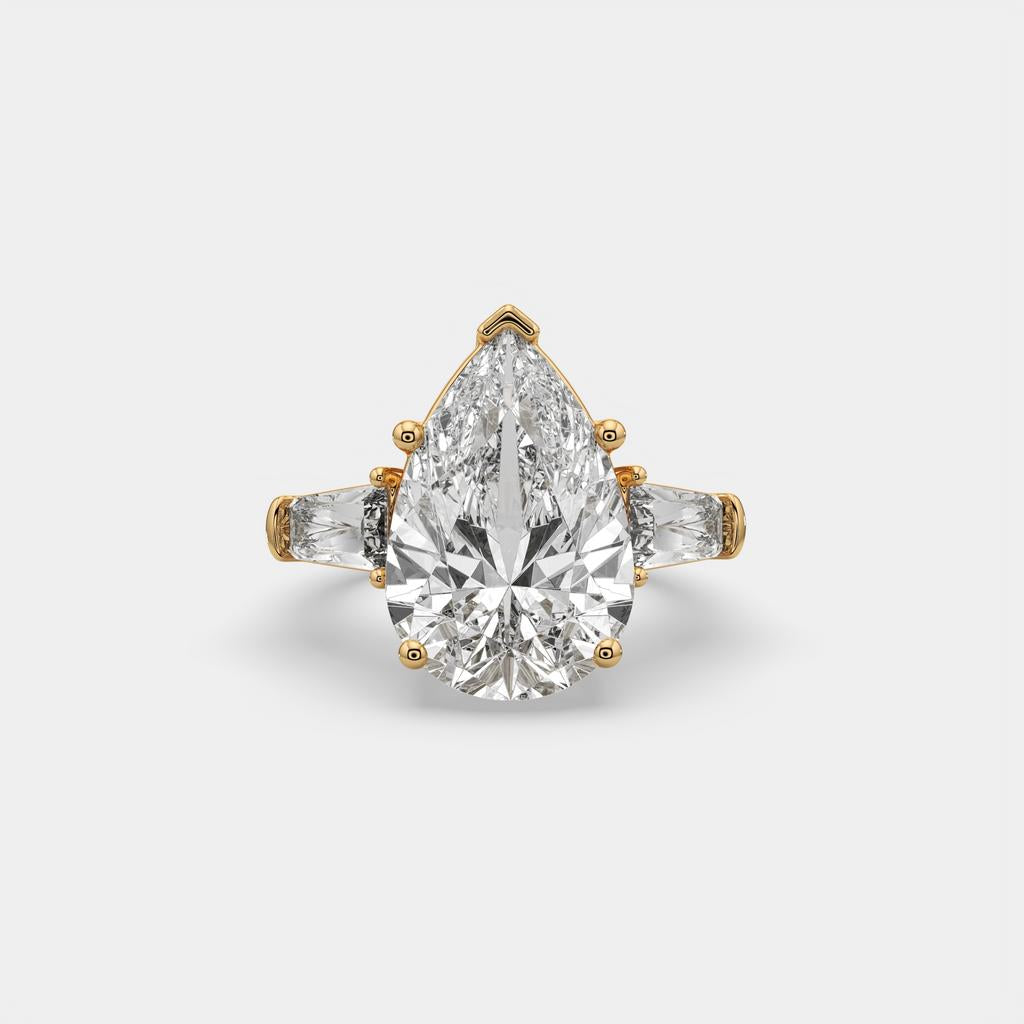 11.50 Ct F Color VS1 Pear Shape Diamond Three Stone Ring With Tapered Baguettes, in yellow gold, top view