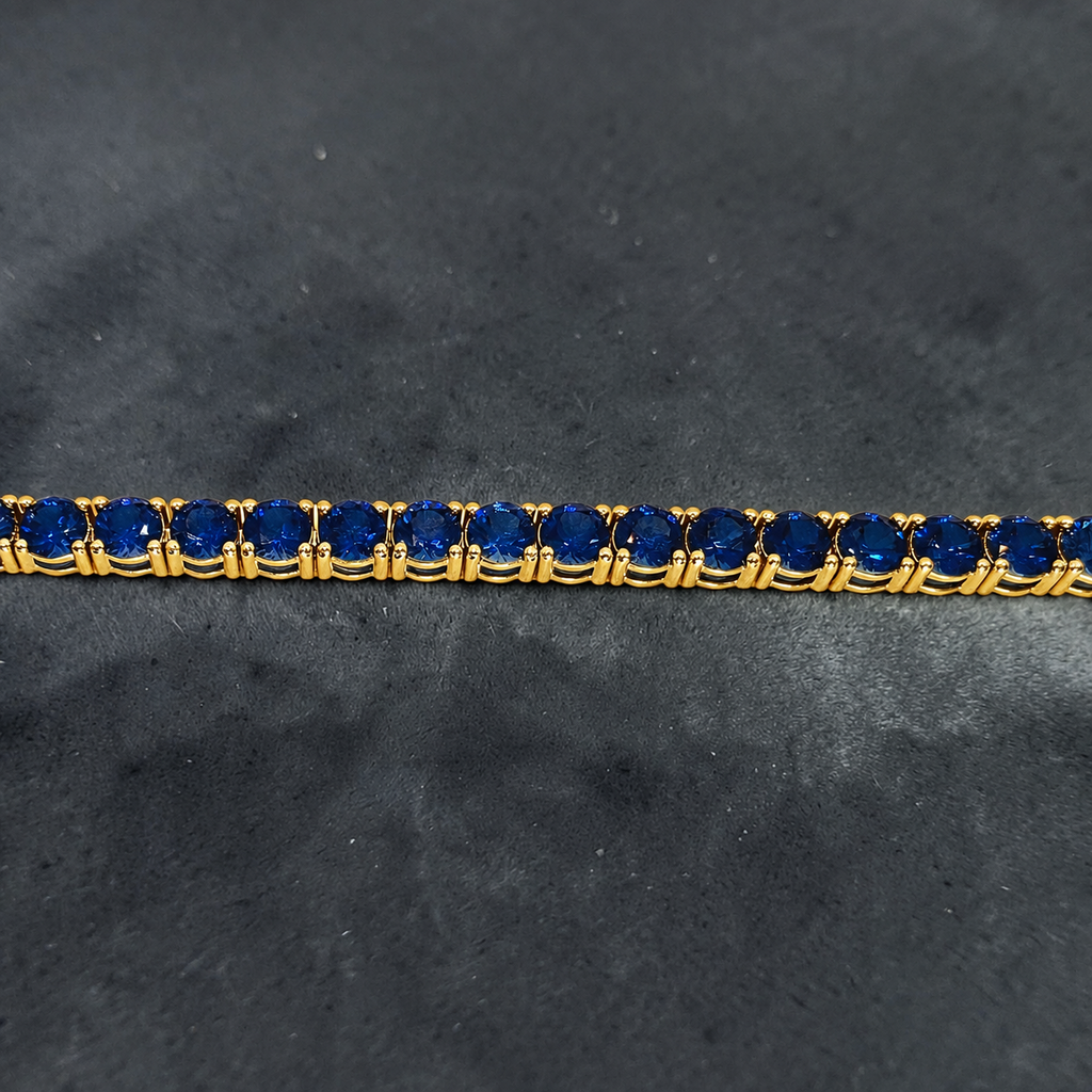 16 CTW Round Blue Sapphire Tennis Bracelet, in yellow gold, side profile