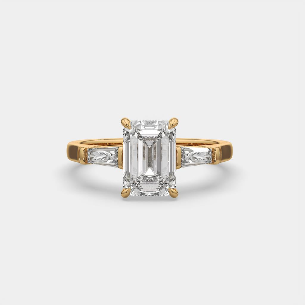 3.50 Ct D Color VS1 Emerald Cut Three Stone Diamond Ring With Tapered Baguettes, in yellow gold, front view