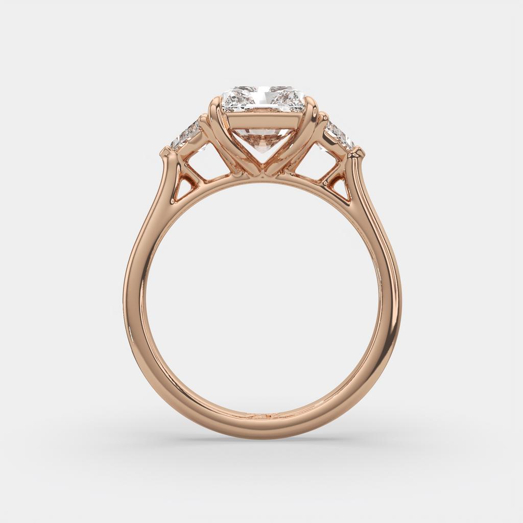 3.50 Ct E VS1 Radiant Three Stone Ring With Trapezoid Accents, in rose gold, side profile