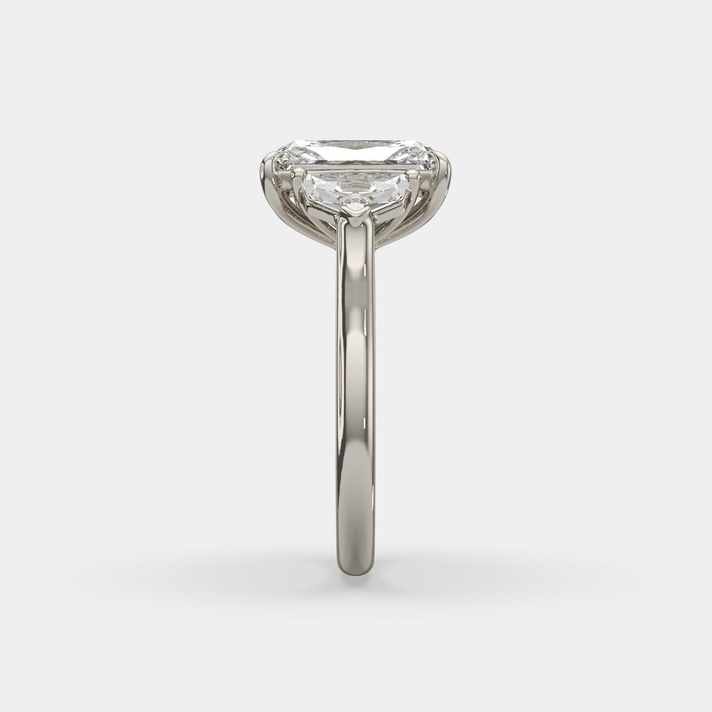 3.50 Ct E VS1 Radiant Three Stone Ring With Trapezoid Accents, in white gold, side profile