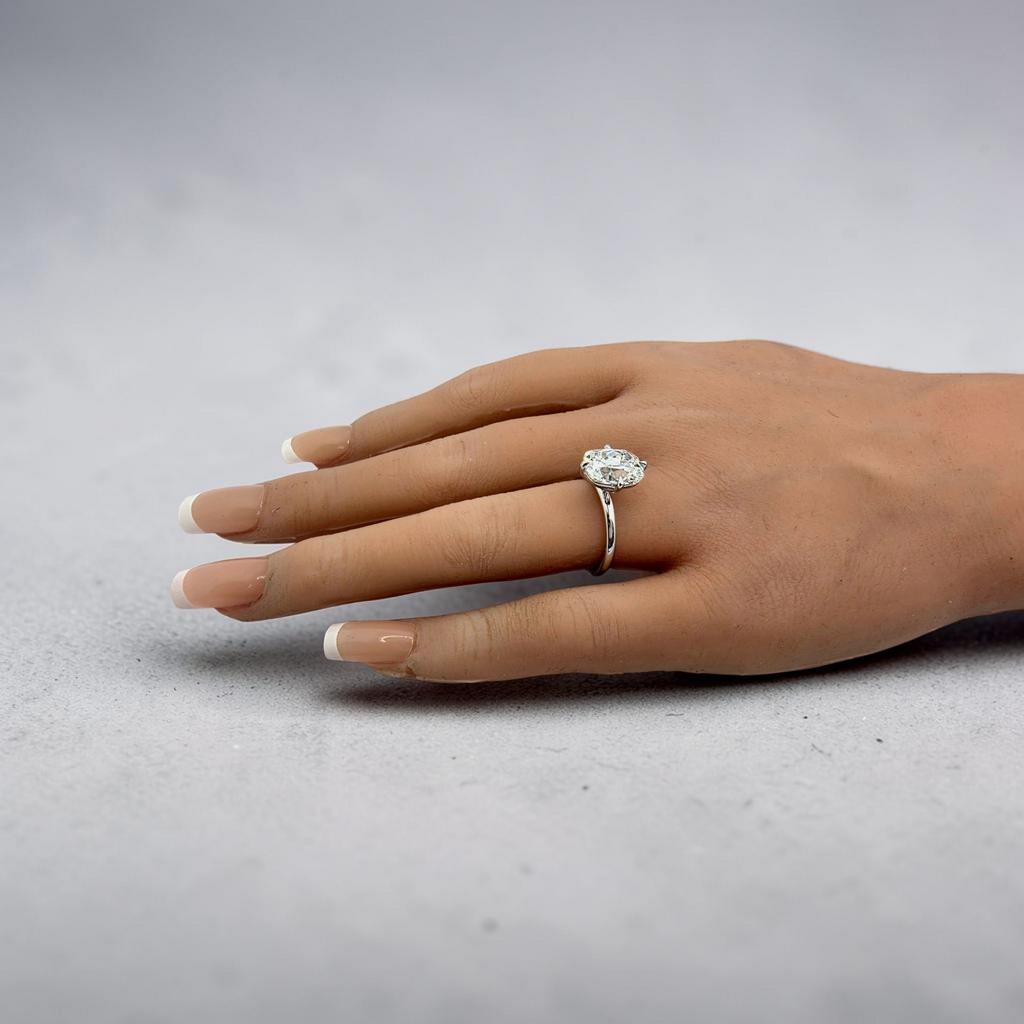 4.00 Ct F VS1 Old Mine Cushion Lab-Grown Diamond Solitaire Ring, in white gold, on hand