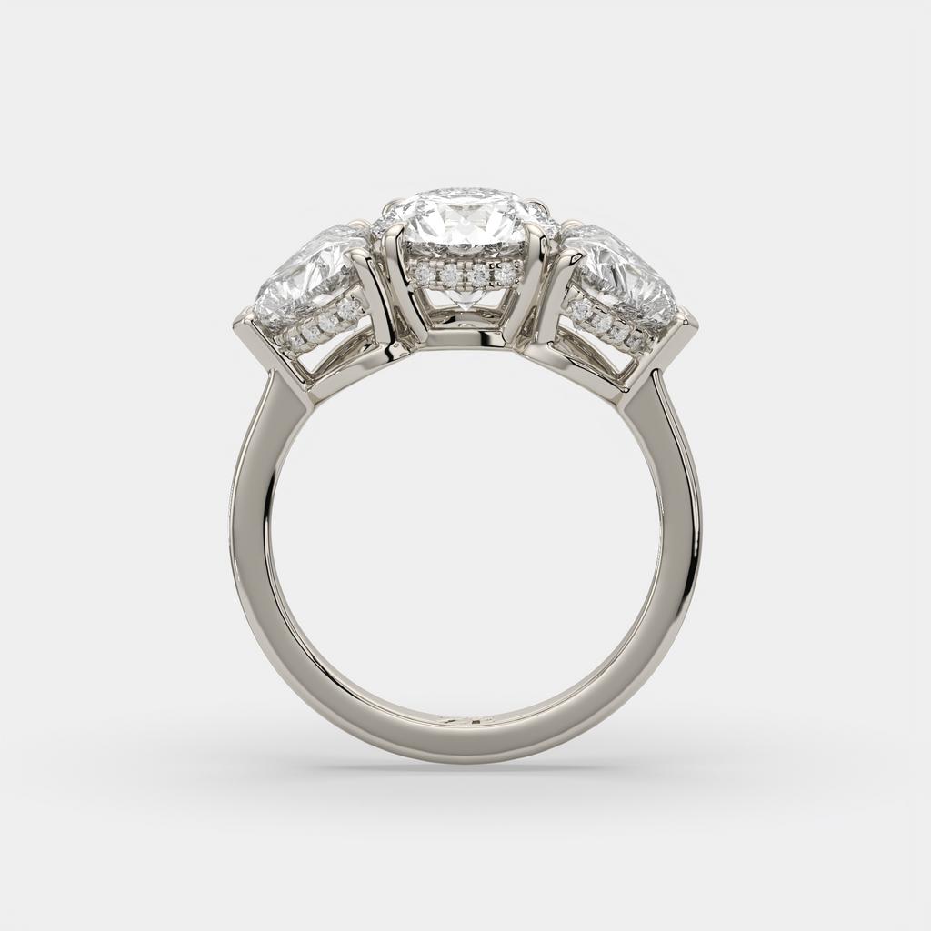 4.15 Ct D VS1 Round 3 Stone Ring With Heart Shape Accents and Halo, in white gold, side profile