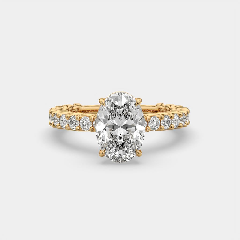 4.20 Ct Oval E VS1 Diamond Ring With Baguette and Round Accents, in yellow gold, front view