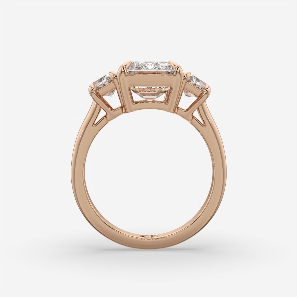 4.60 Ct E VS1 Emerald Cut Diamond Three Stone Ring with Step Cut Trapezoid Accents, in rose gold, front view