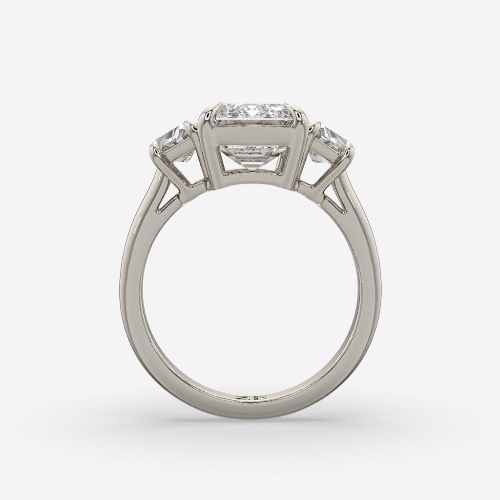 4.60 Ct E VS1 Emerald Cut Diamond Three Stone Ring with Step Cut Trapezoid Accents, in white gold, front view