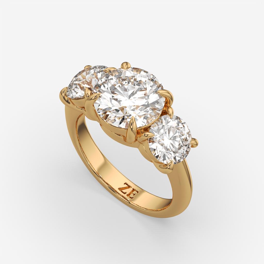5.00 Ct E VS1 Round Diamond Three Stone Ring, in yellow gold, front view