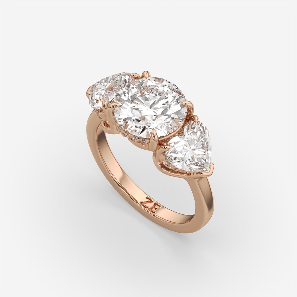 5.20 Ct D VS1 Round Three Stone Ring With Heart Shape Accents and Halo, in rose gold, front view
