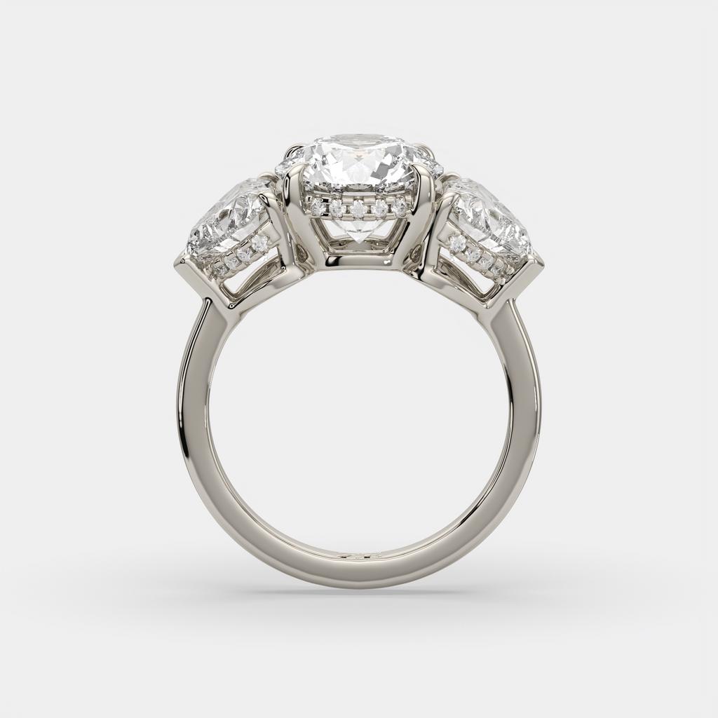 5.20 Ct D VS1 Round Three Stone Ring With Heart Shape Accents and Halo, in white gold, side profile