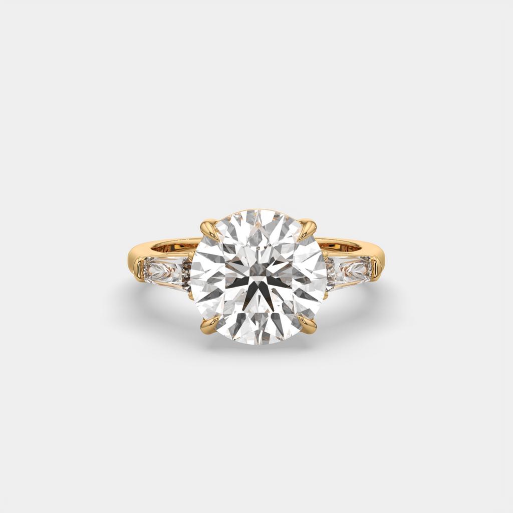5.70 Ct E Color VS1 Round Diamond Three Stone Ring With Tapered Baguettes, in yellow gold, front view