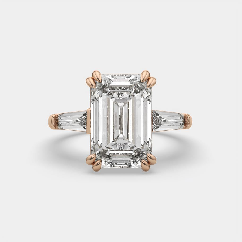 6.70 Ct F VS1 Emerald Cut Three Stone Diamond Ring With Tapered Baguettes, in rose gold, front view