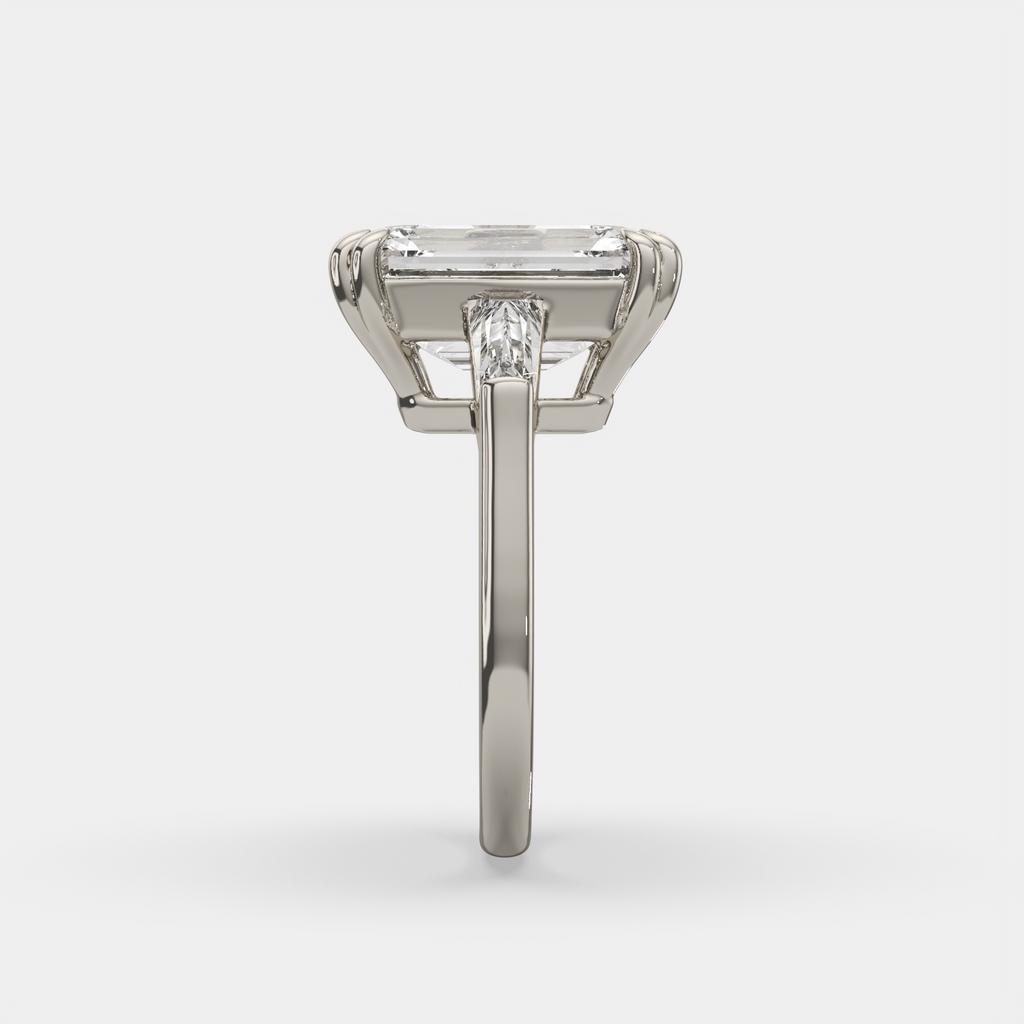 6.70 Ct F VS1 Emerald Cut Three Stone Diamond Ring With Tapered Baguettes, in white gold, front view