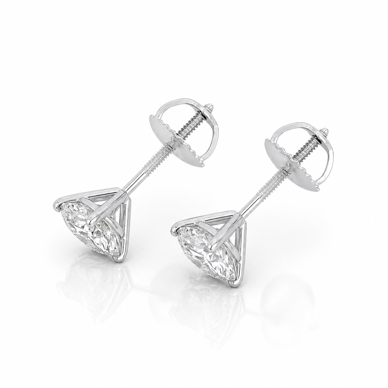 1.00 Carat Diamond Stud Earrings D VS1 Round Brilliant – Martini or Basket Setting