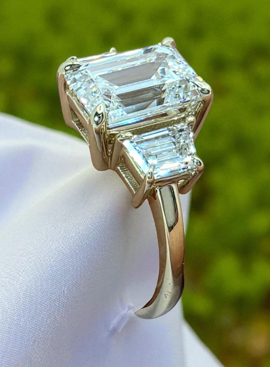3.80Ct Emerald Cut Lab Grown Diamond Three Stone Engagement Ring 14k Yellow Gold