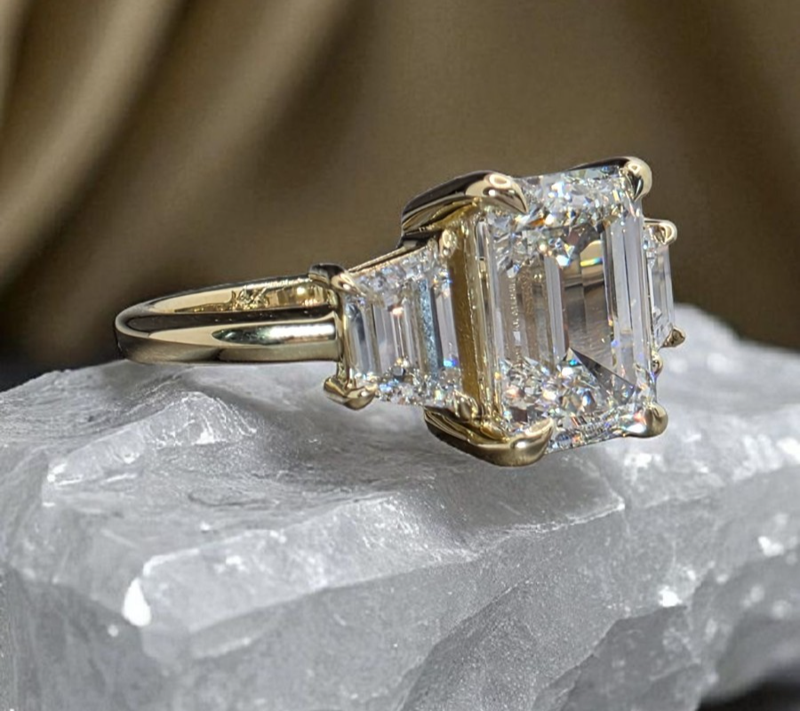 3.80Ct Emerald Cut Lab Grown Diamond Three Stone Engagement Ring 14k Yellow Gold
