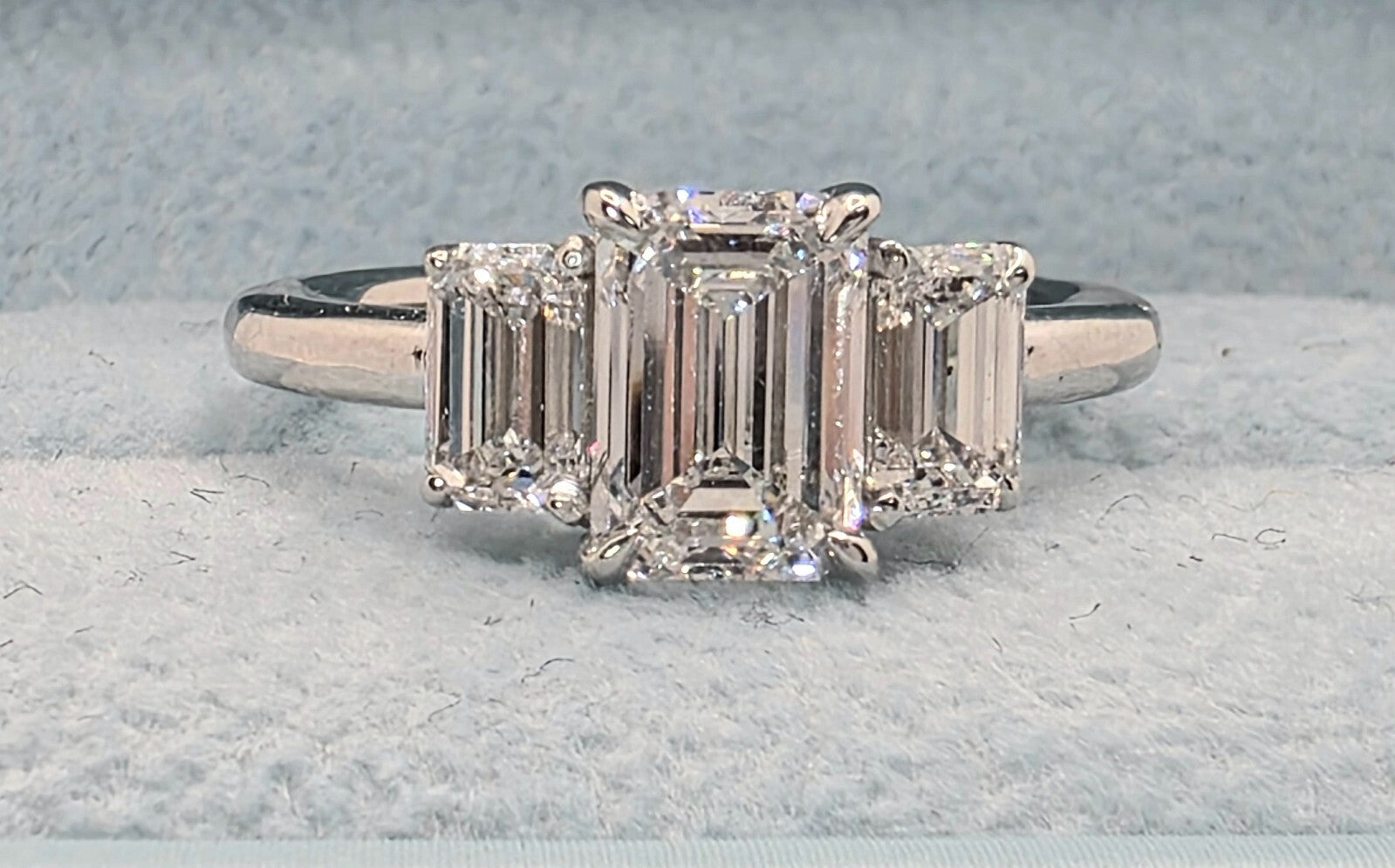 2.50 Ct Emerald Cut Certified Lab Grown Diamond 3 Stone Ring Platinum