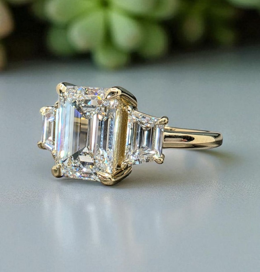 3.80Ct Emerald Cut Lab Grown Diamond Three Stone Engagement Ring 14k Yellow Gold