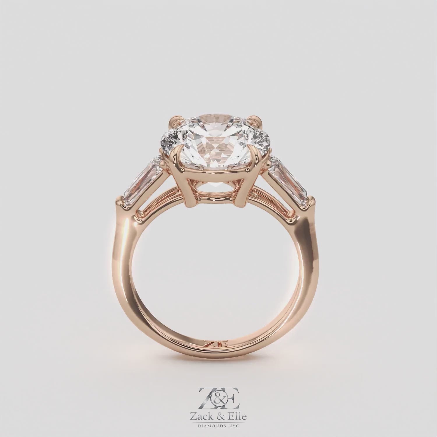 5.70 Ct E Color VS1 Round Diamond Three Stone Ring With Tapered Baguettes, in white gold, 360 spin
