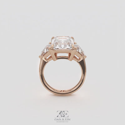 7.20 Ct E VS1 Radiant Cut Lab-Grown Diamond Three Stone Ring with Trapezoid Side Diamonds, in rose gold, 360 spin