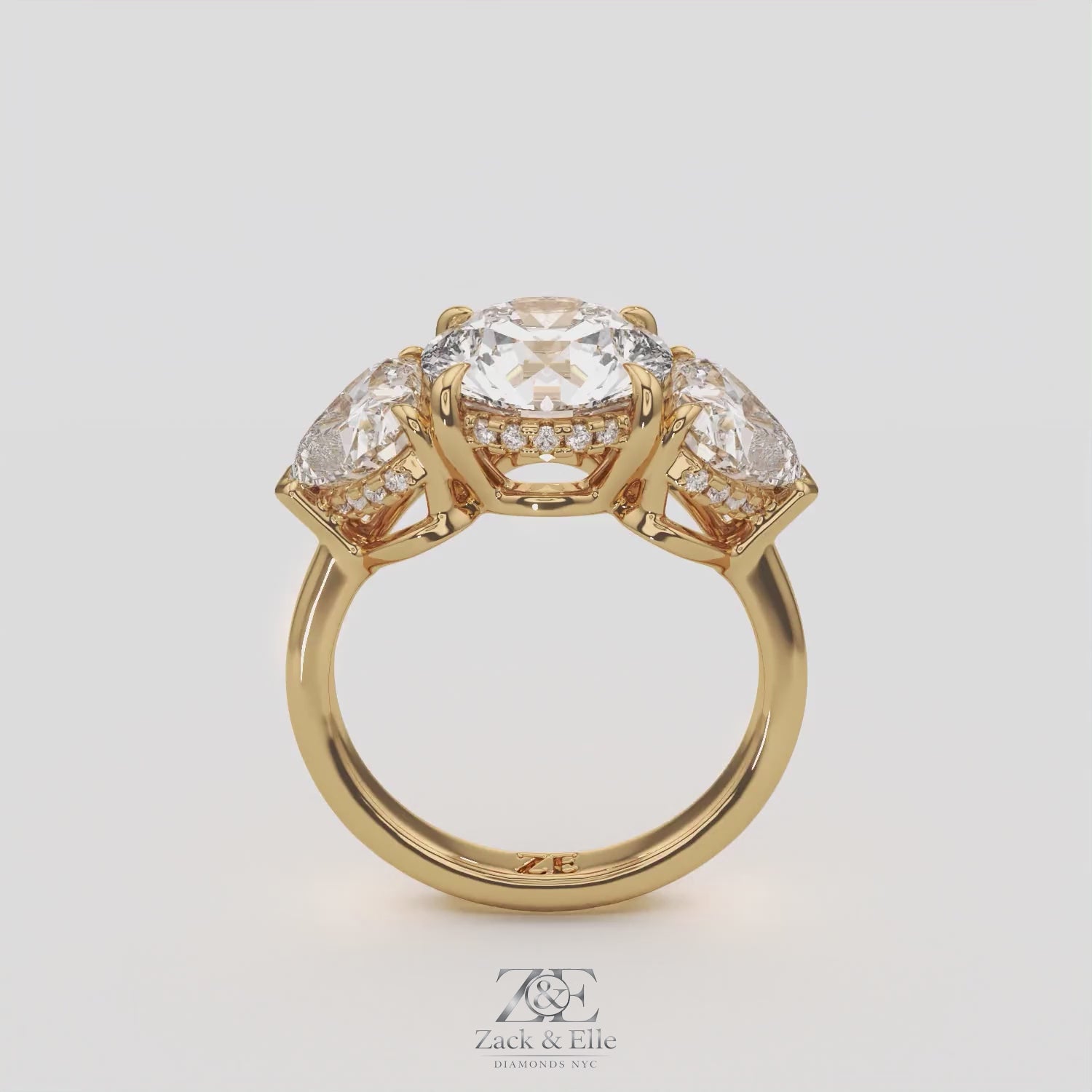 5.20 Ct D VS1 Round Three Stone Ring With Heart Shape Accents and Halo, in white gold, 360 spin