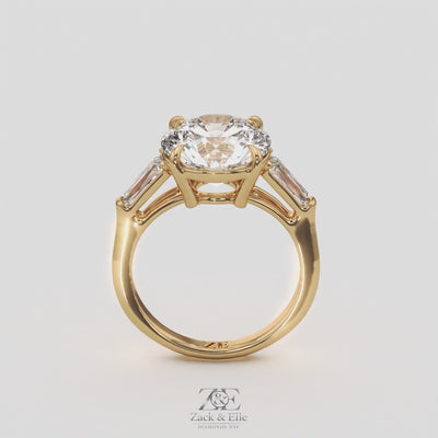 5.70 Ct E Color VS1 Round Diamond Three Stone Ring With Tapered Baguettes, in white gold, 360 spin