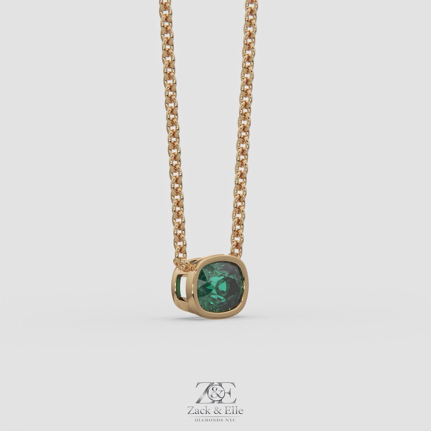 3.00 Ct Cushion Green Emerald East West Pendant, in yellow gold, 360 spin