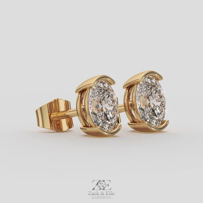 2.00 Ct D VS1 Oval Semi Bezel Diamond Studs, in yellow gold, 360 spin