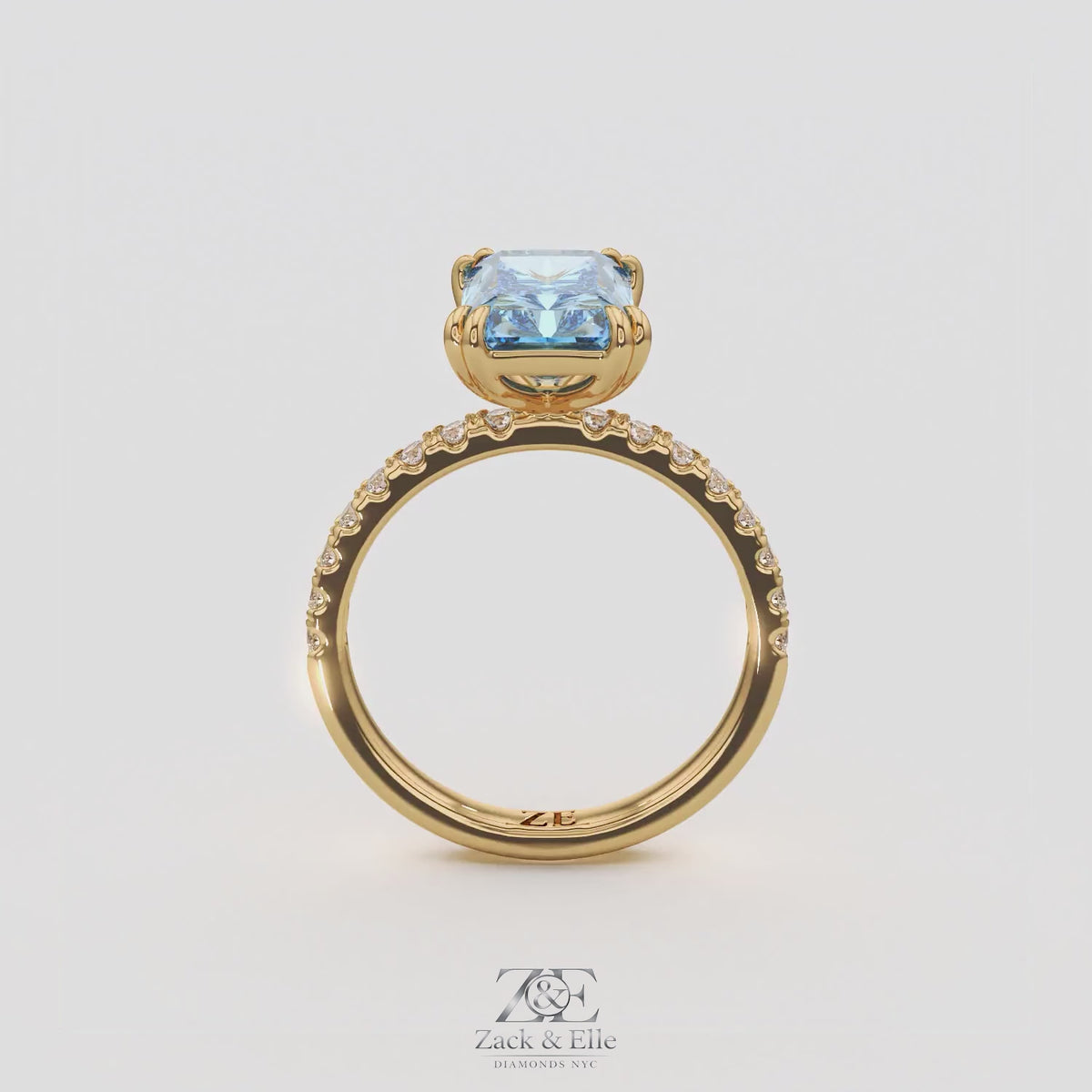 3.30 Ct Fancy Vivid Blue VS2 Radiant Lab-Grown Diamond Ring with Round Accents, in yellow gold, 360 spin