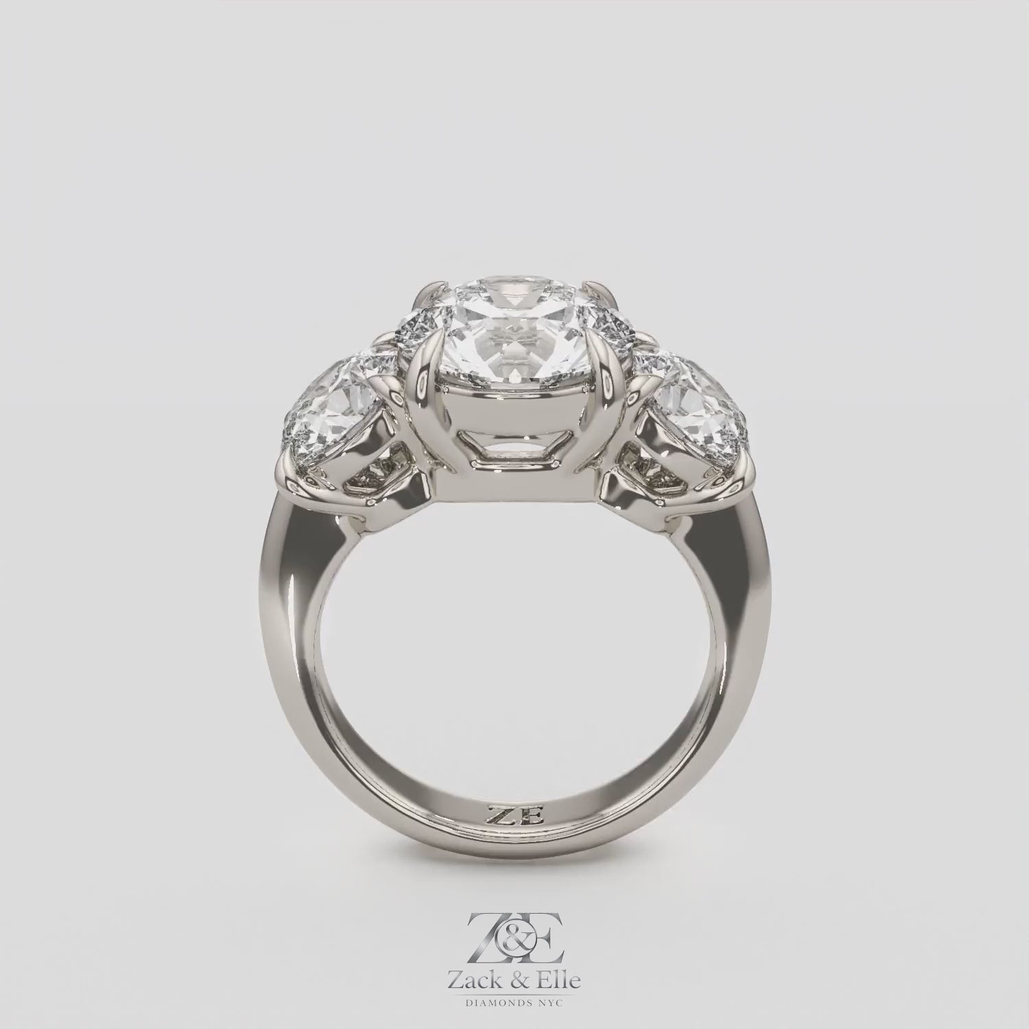 5.00 Ct E VS1 Round Diamond Three Stone Ring, in white gold, 360 spin