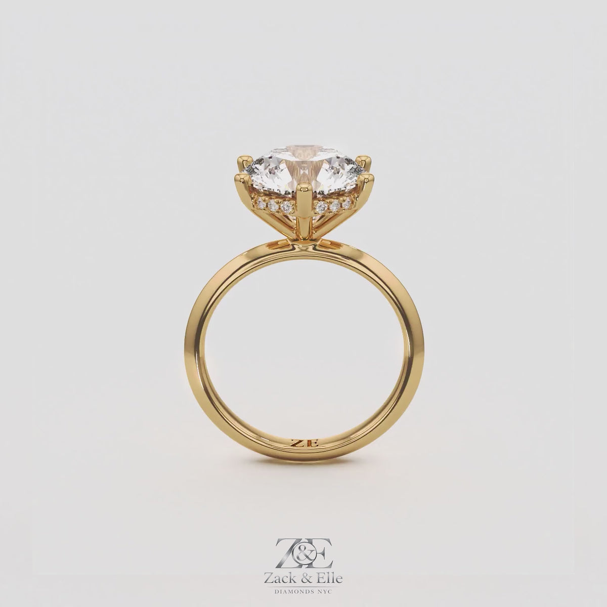 4.10 Ct E VS1 Round Lab-Grown Diamond Hidden Halo Engagement Ring, in yellow gold, 360 spin