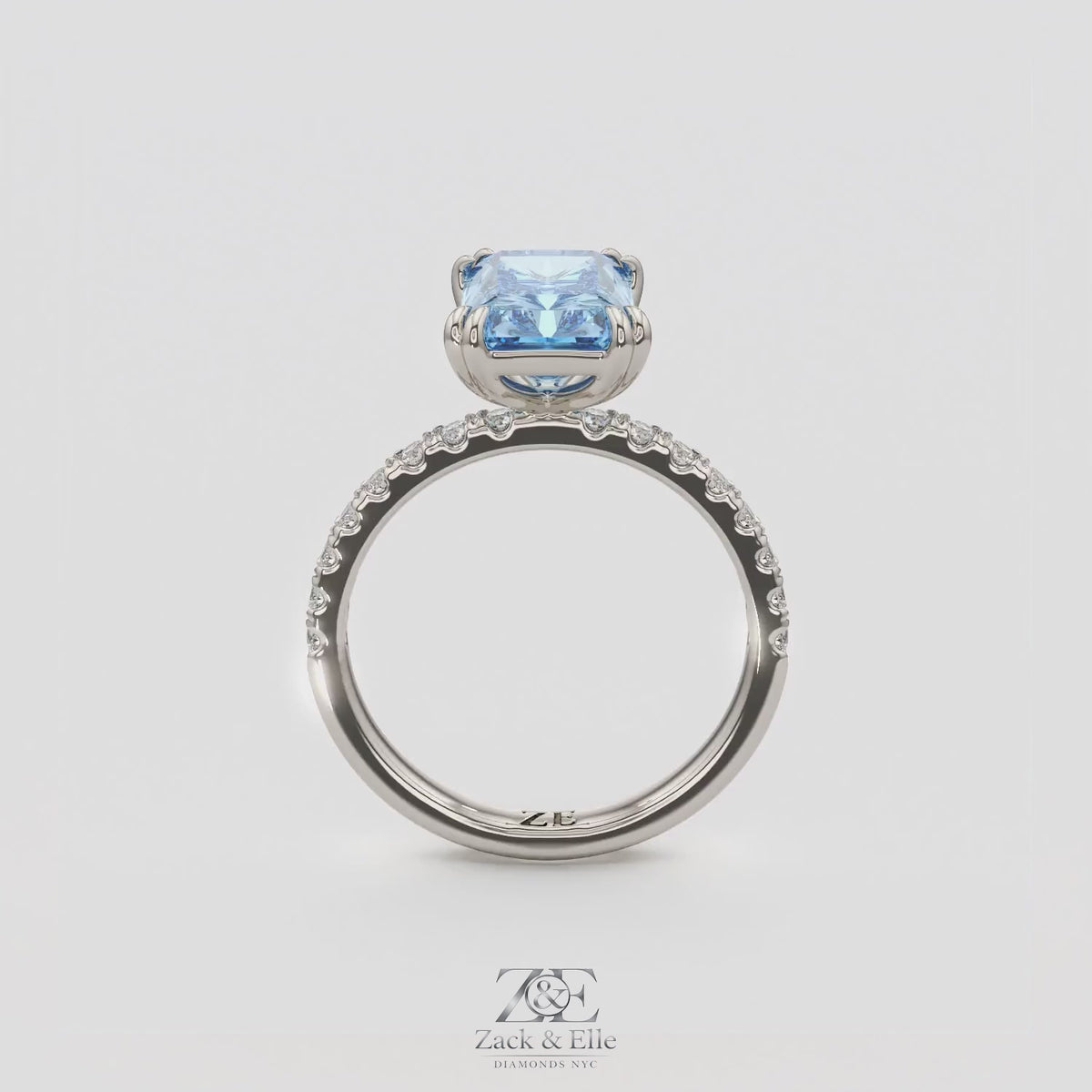 3.30 Ct Fancy Vivid Blue VS2 Radiant Lab-Grown Diamond Ring with Round Accents, in white gold, 360 spin