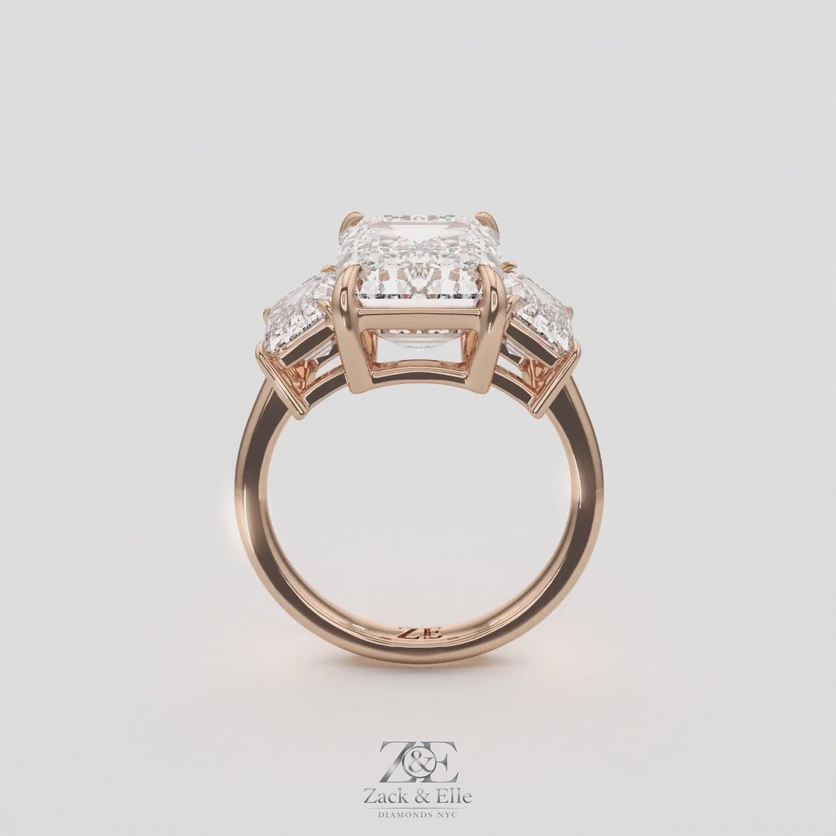 8.00 Ct E VS1 Emerald Cut Lab Grown Diamond Three Stone Ring, in rose gold, 360 spin
