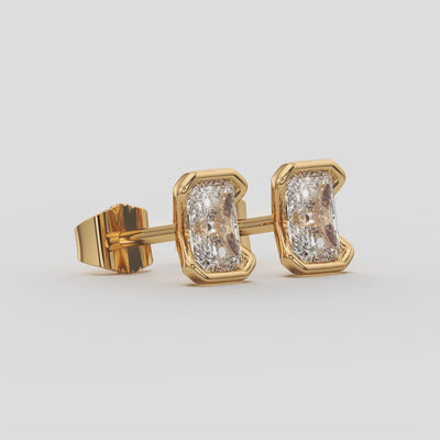 2.00 Ct E Color VS1 Radiant Cut Half-Bezel Stud Earrings, in yellow gold, 360 spin