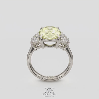 5.70 Ct Fancy Intense Yellow Oval Diamond Three Stone Ring With Half Moon Accents, in white gold, 360 spin