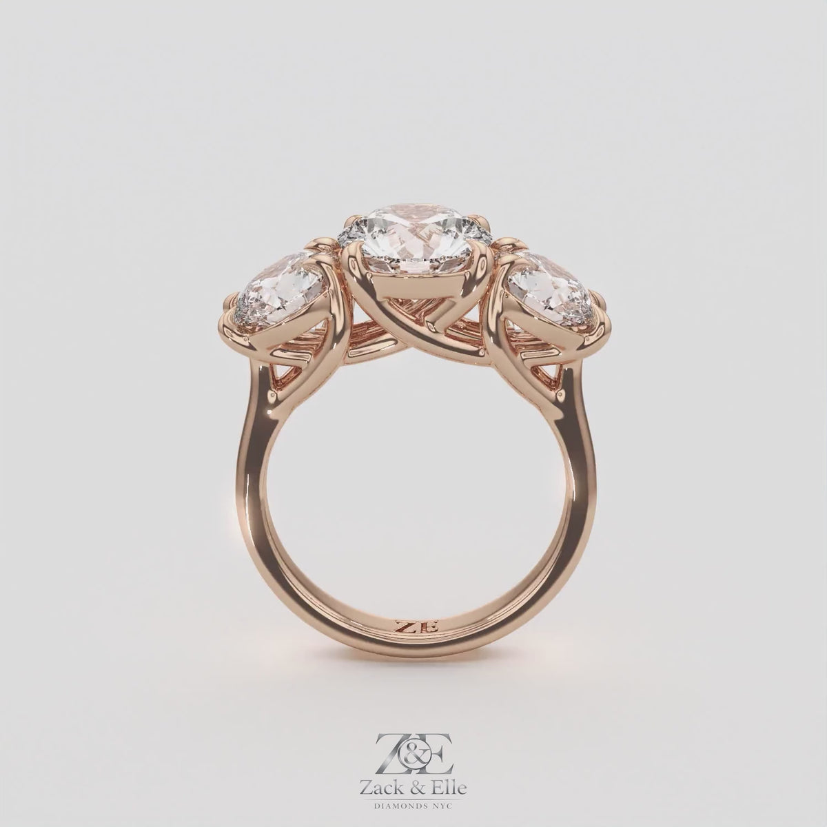 4.00 Ct D Color VS1 Round Lab Grown Diamond 3 Stone Ring, in rose gold, 360 spin