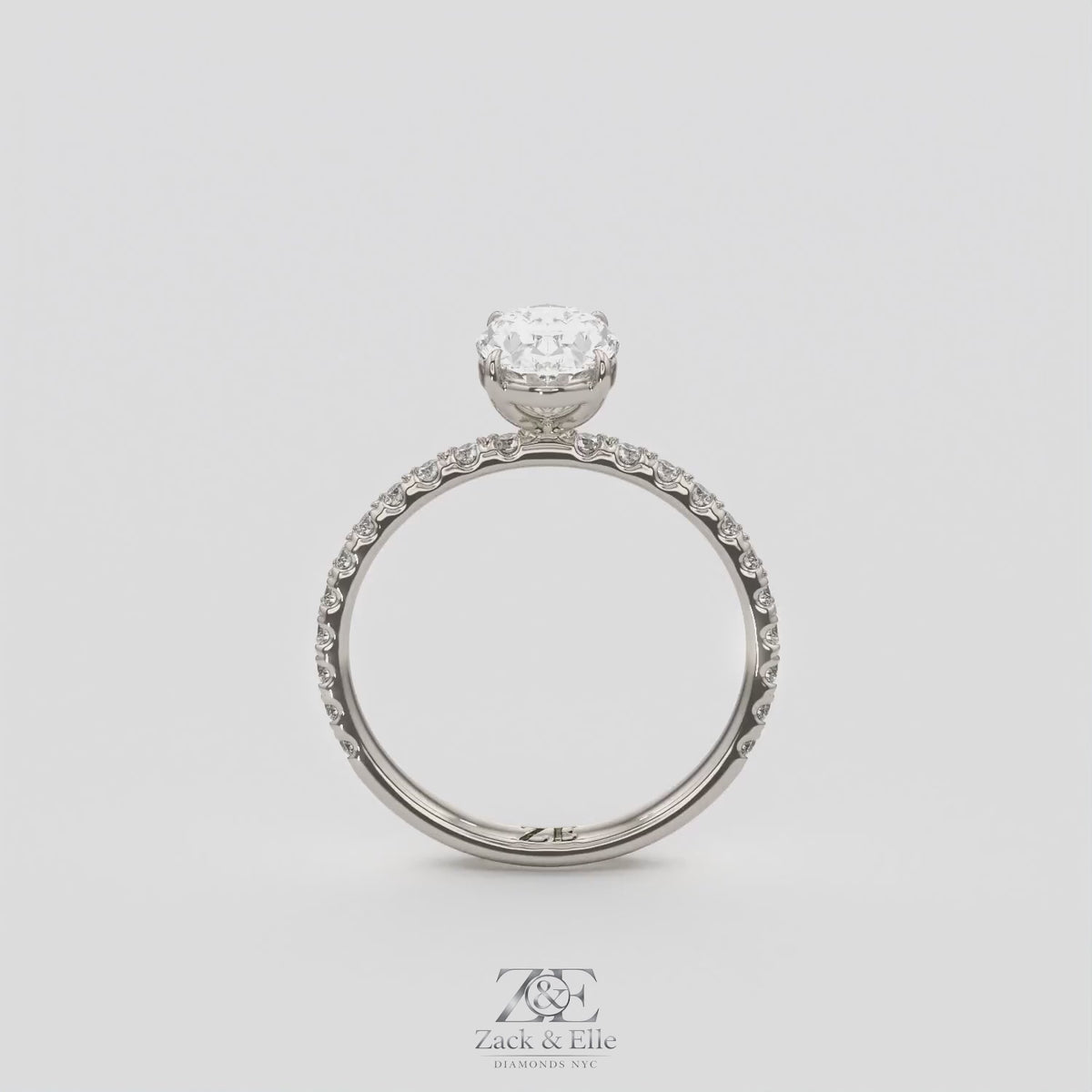 1.30 Ct D VS1 Oval Lab-Grown Diamond Ring with Round Accents, in white gold, 360 spin