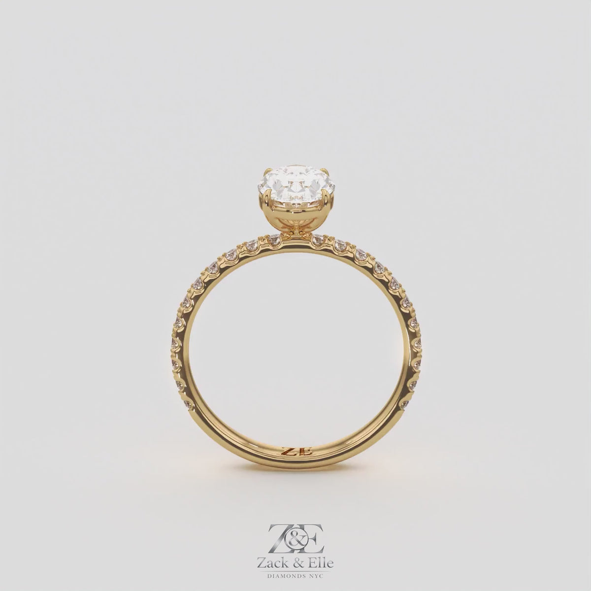 1.30 Ct D VS1 Oval Lab-Grown Diamond Ring with Round Accents, in yellow gold, 360 spin