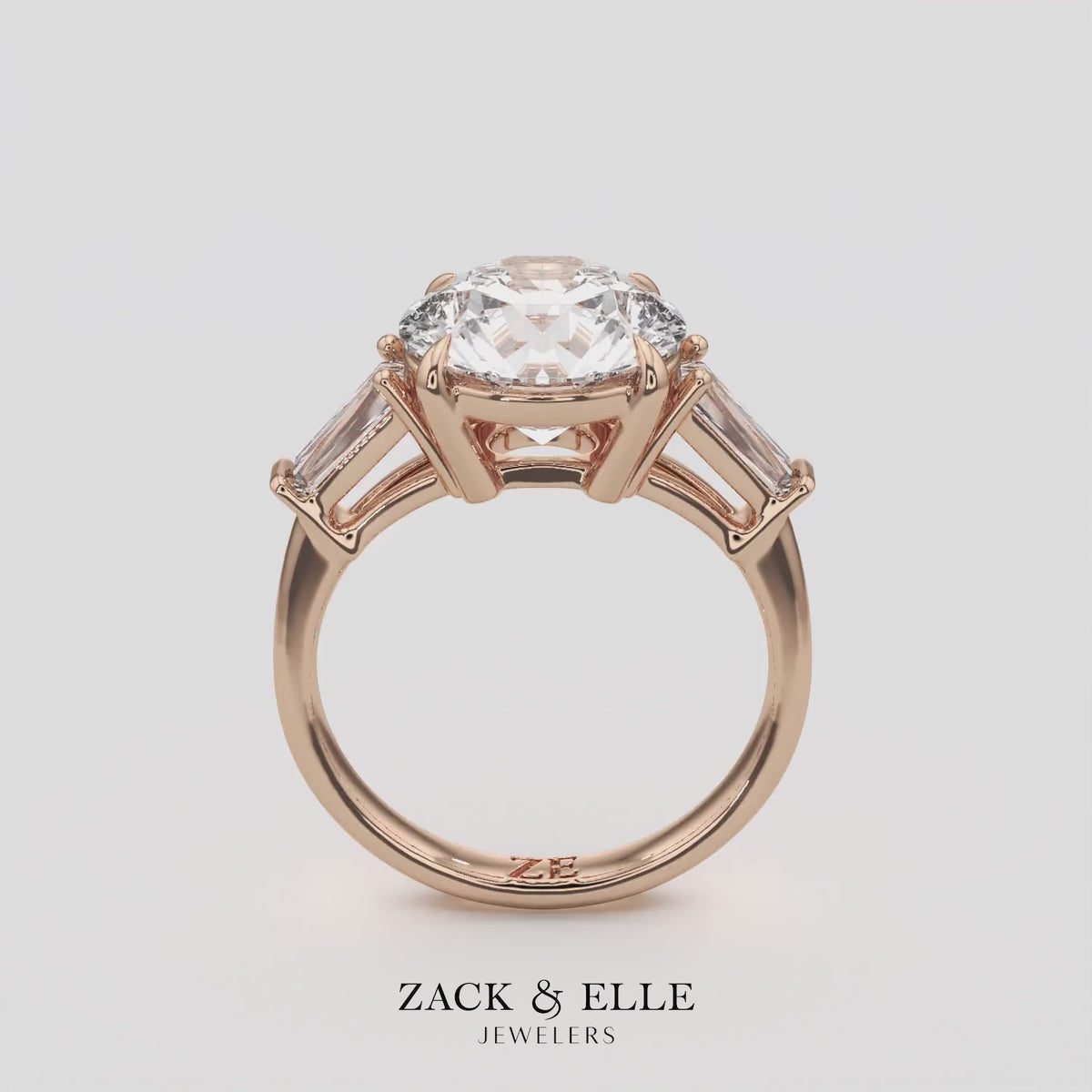 2.40 Ct D Color VS1 Round Diamond Three Stone Ring With Tapered Baguettes, in rose gold, 360 spin