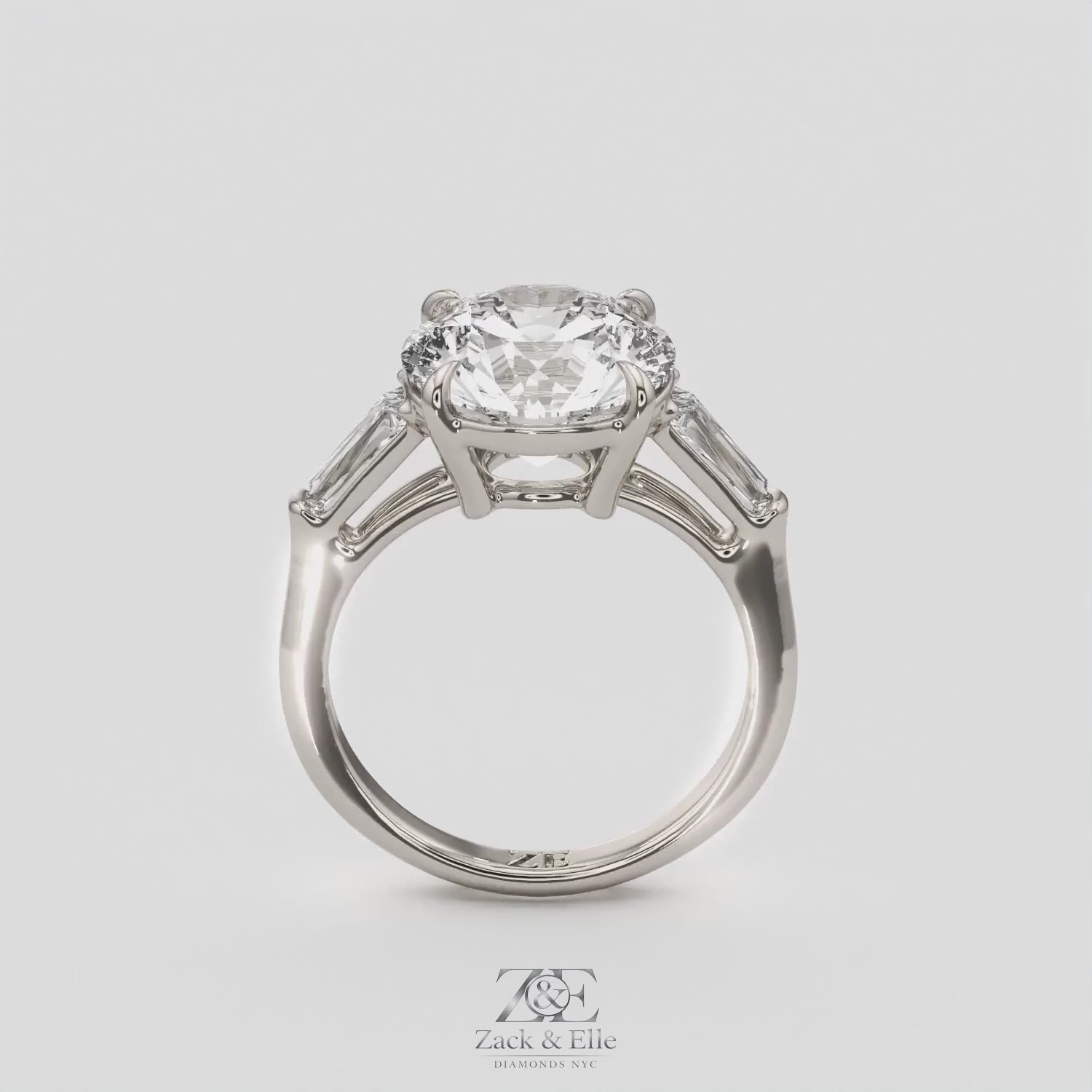 5.70 Ct E Color VS1 Round Diamond Three Stone Ring With Tapered Baguettes, in white gold, 360 spin