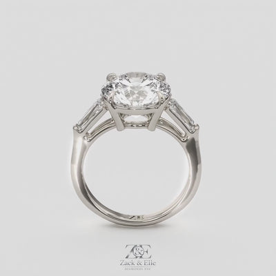 5.70 Ct E Color VS1 Round Diamond Three Stone Ring With Tapered Baguettes, in white gold, 360 spin