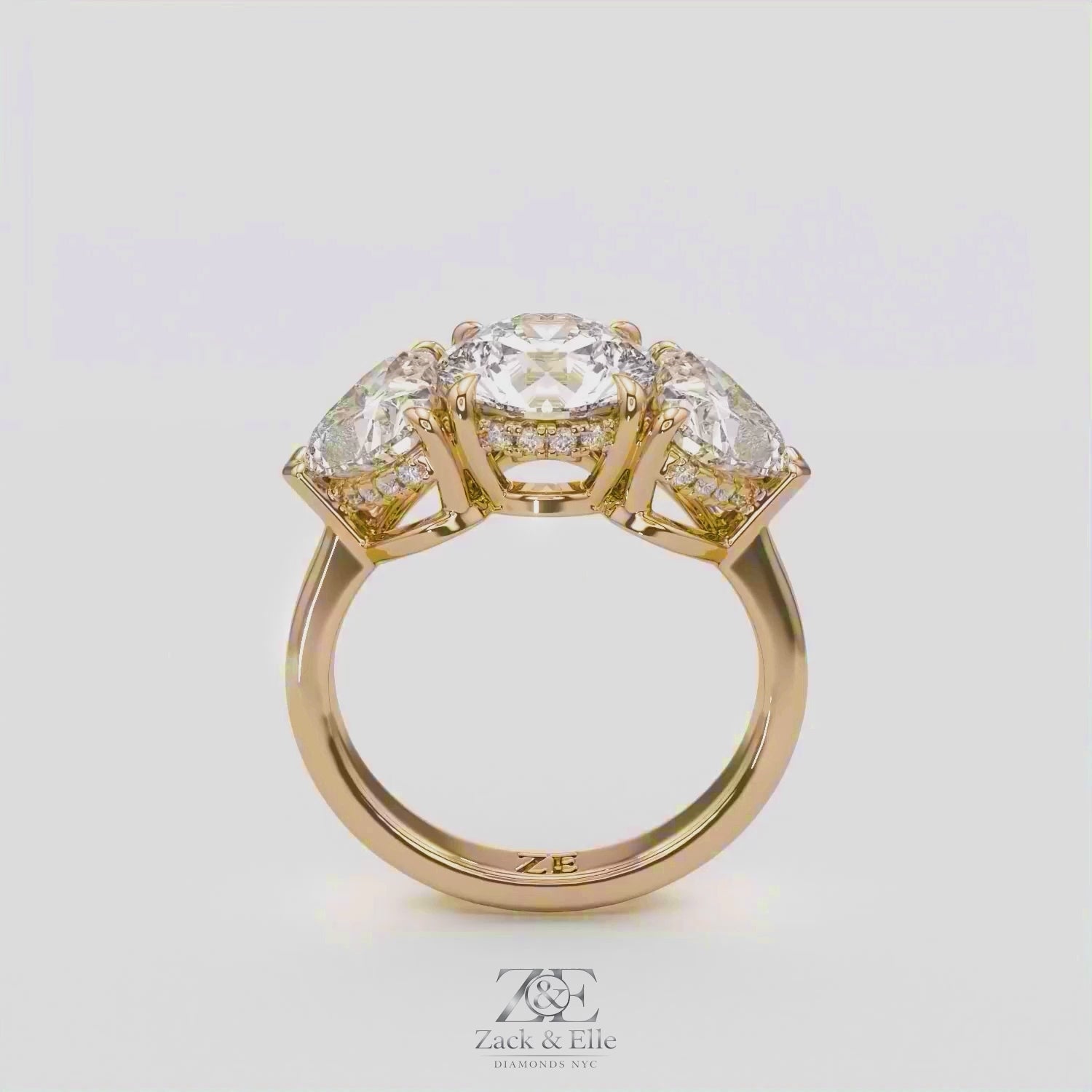 4.15 Ct D VS1 Round 3 Stone Ring With Heart Shape Accents and Halo, in white gold, 360 spin