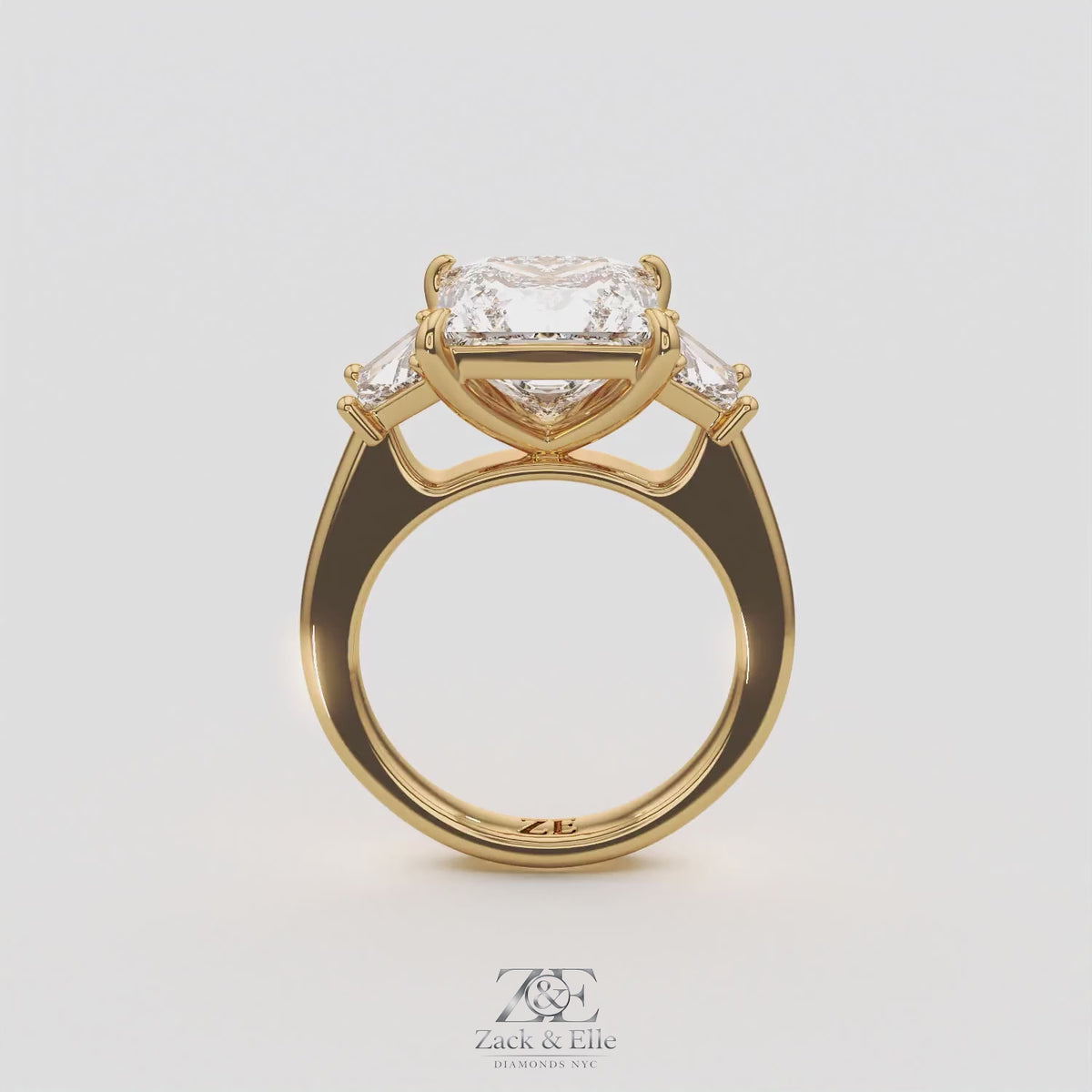 4.60 Ct E VS1 Princess Cut Lab-Grown Diamond Three Stone Ring with Trapezoid Accents, in yellow gold, 360 spin
