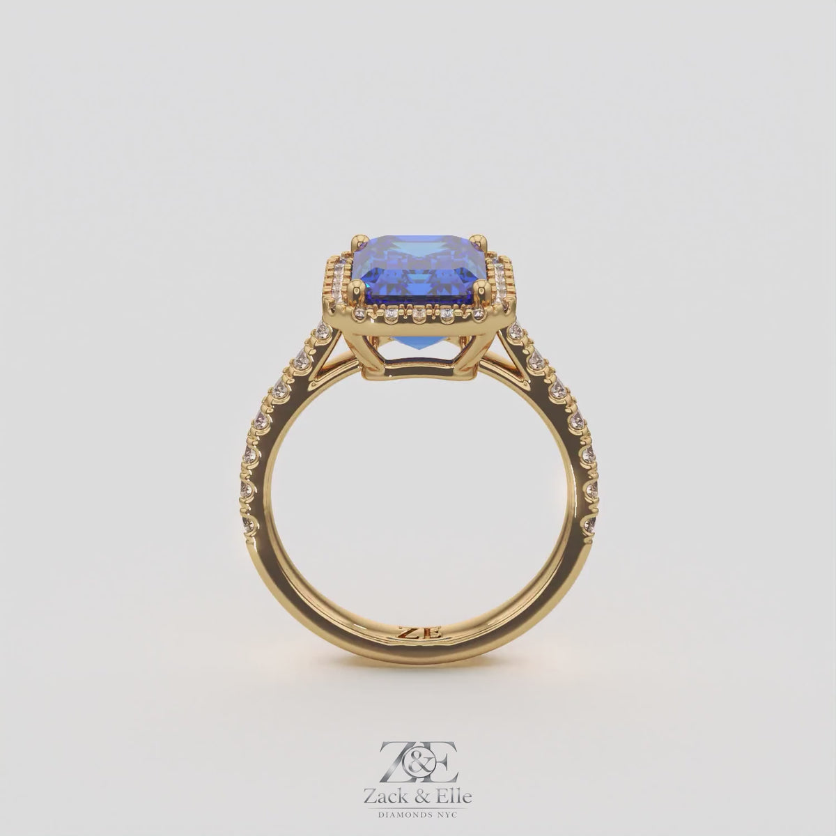 3.50 Ct Emerald Cut Blue Sapphire and Diamond Ring, in yellow gold, 360 spin