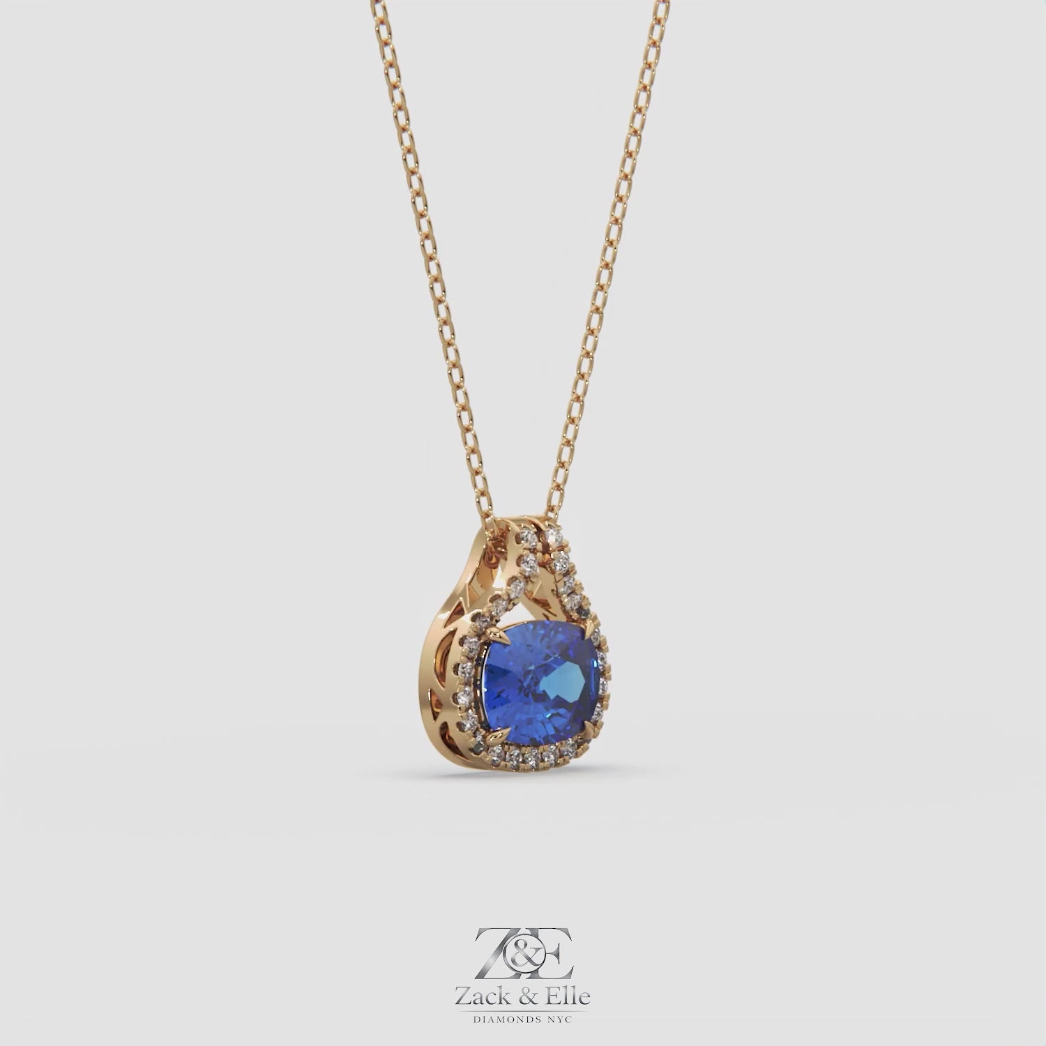 2.20 Ct Cushion Blue Sapphire Diamond East West Pendant, in yellow gold, 360 spin