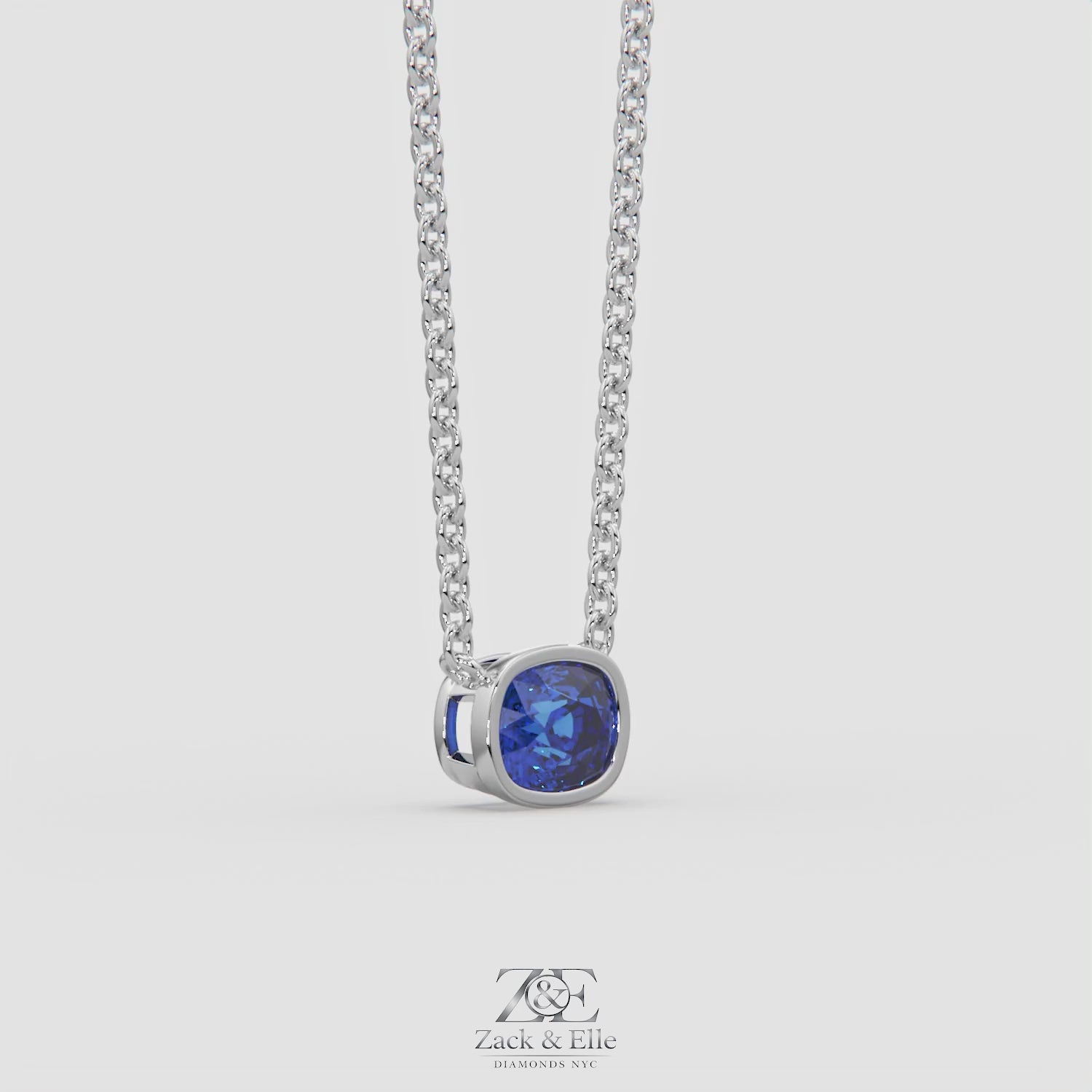 3.00 Ct Cushion Blue Sapphire East West Pendant, in white gold, 360 spin
