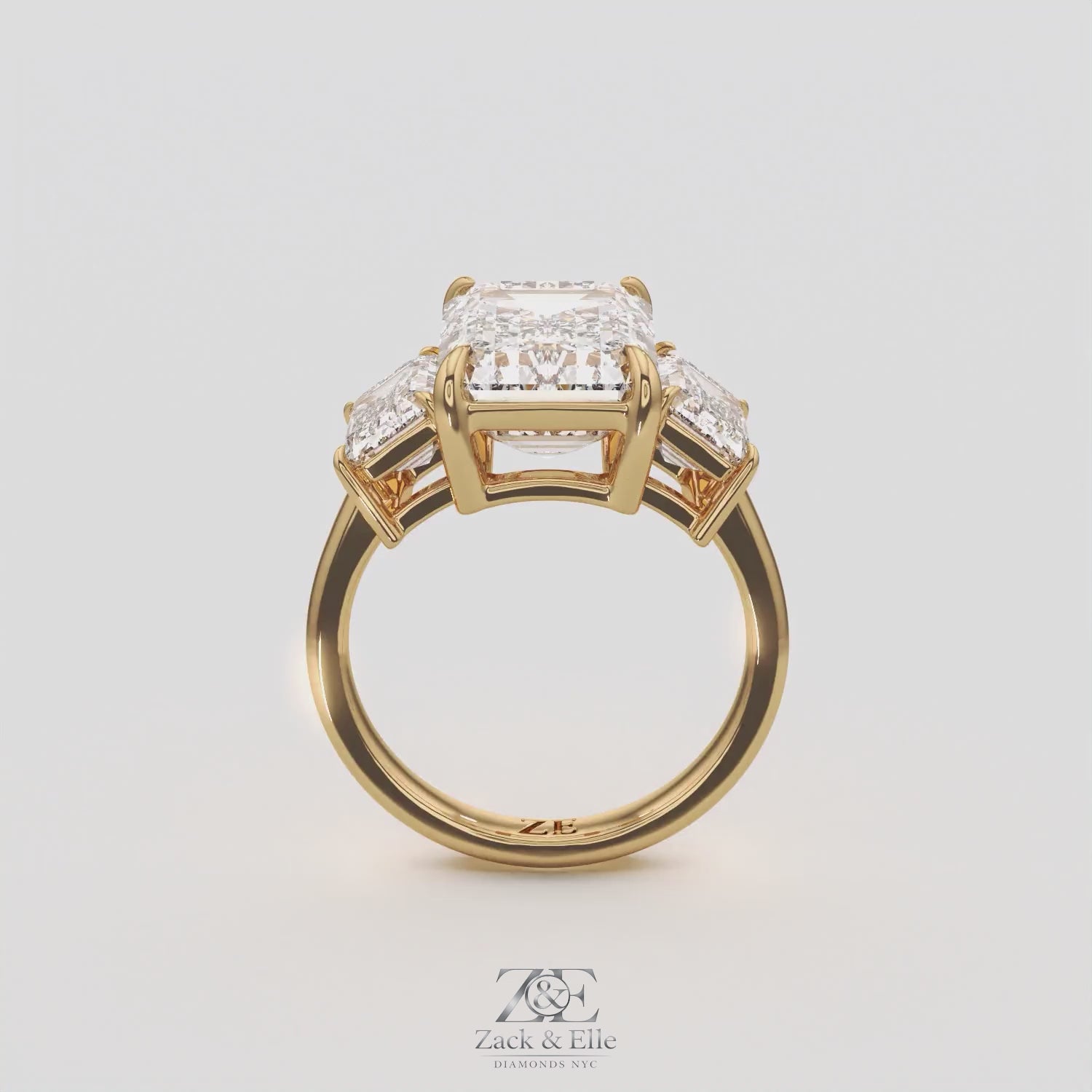 8.00 Ct E VS1 Emerald Cut Lab Grown Diamond Three Stone Ring, in yellow gold, 360 spin