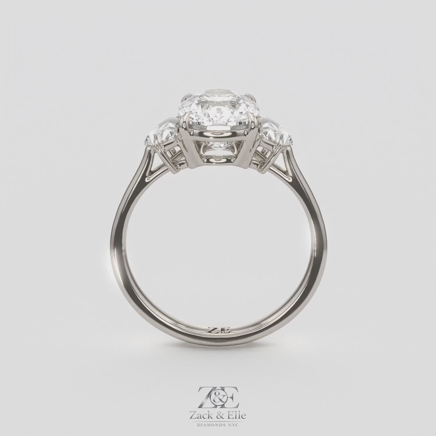 3.50 Ct E VS1 Cushion Lab Grown Diamond Three Stone Ring, in white gold, 360 spin